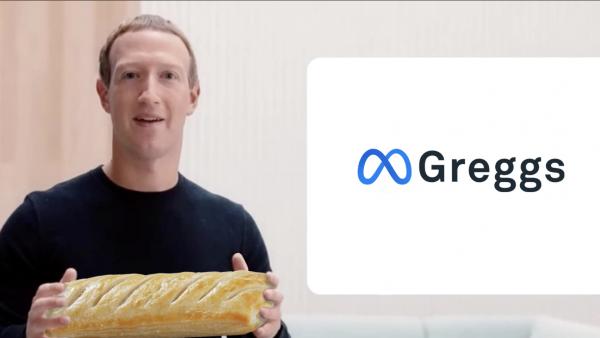 mark zuckerberg holding a Greggs sausage roll